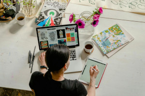 You want a website developer with artistic talent